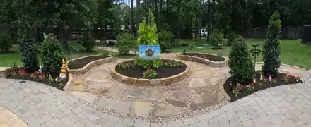 Flagstone patio with raised planter beds (photo 7 of 8)