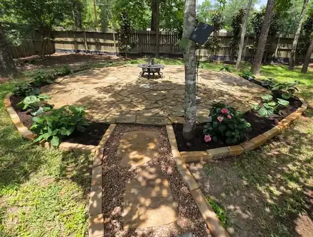 Flagstone seating area and path under trees