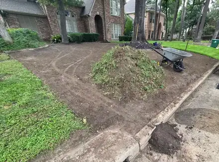 Lawn being leveled and repaired (photo 2 of 8)