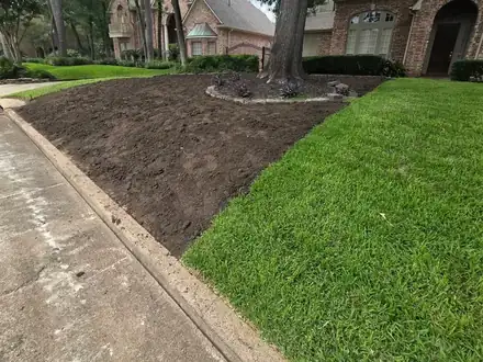 Lawn being leveled and repaired (photo 3 of 8)